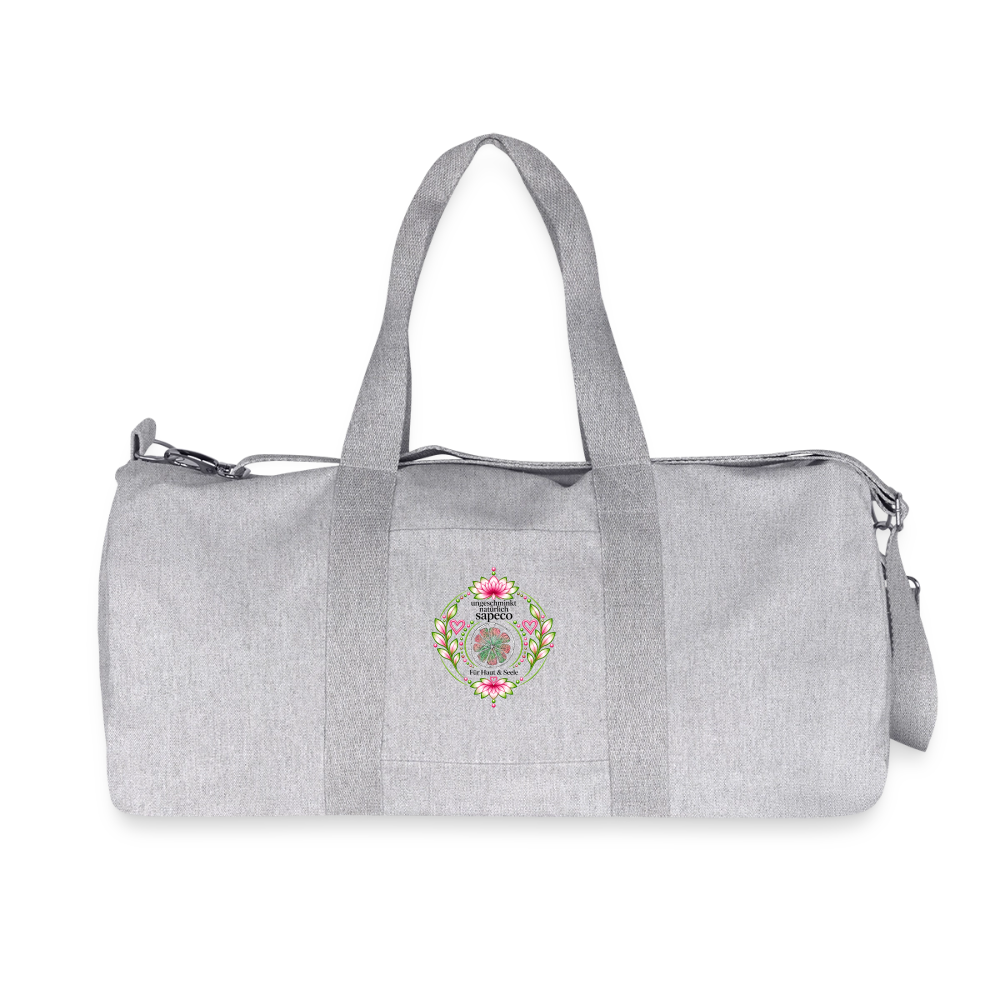 Graue Herzchakra-Sporttasche von sapeco mit rosa-grünem Lotusmotiv, zwei Tragegriffen und abnehmbarem Schultergurt.